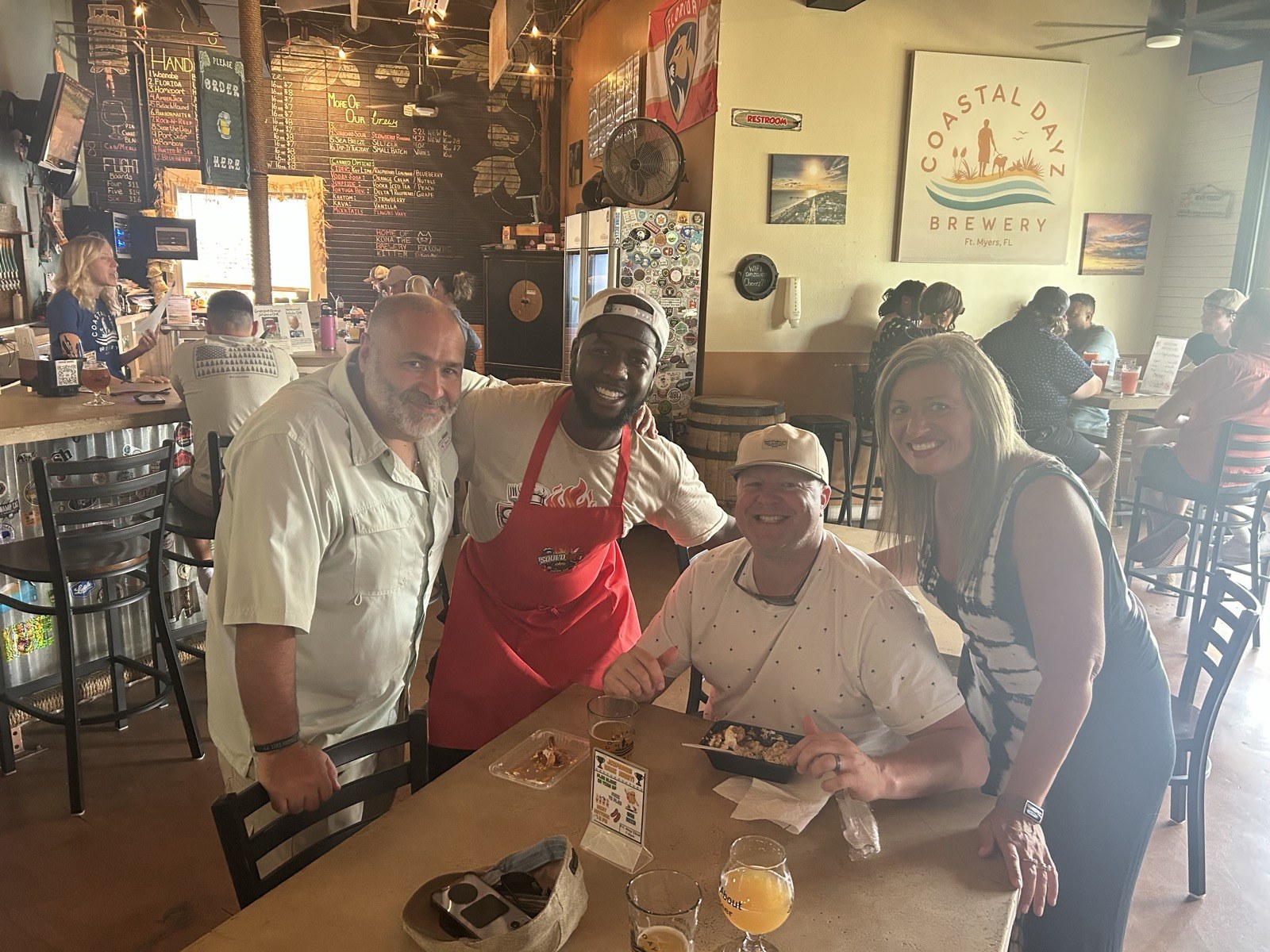 Chef Demarquis with happy customers at Coastal Dayz Brewery, Fort Myers