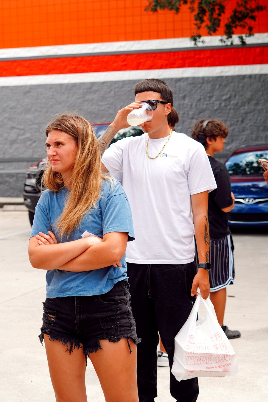 Satisfied customers leaving with food